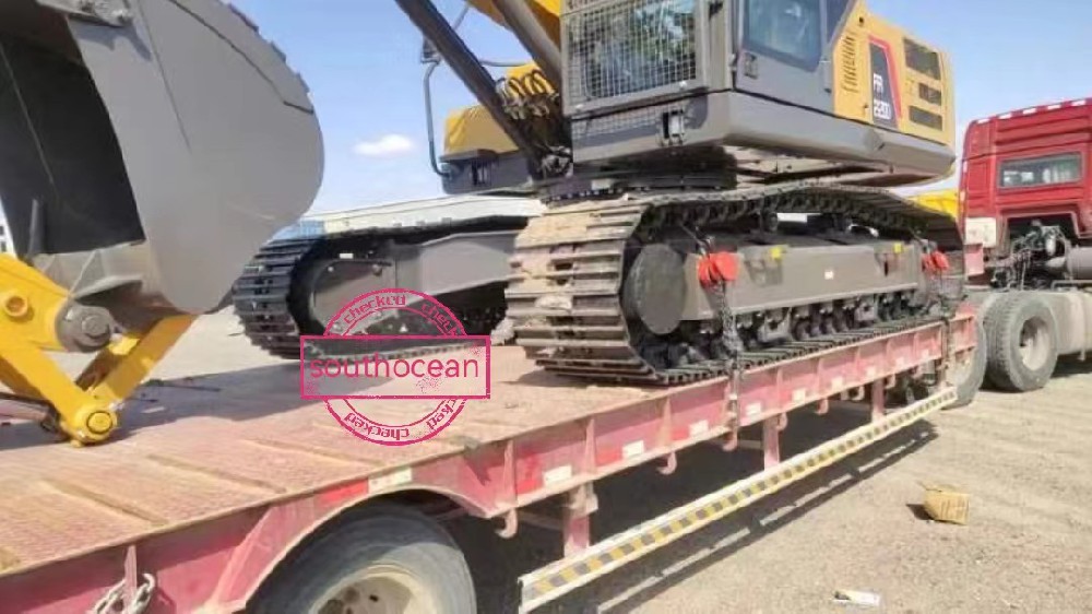 OOG transport - Foton & XCMG heavy equipment on flatbed truck